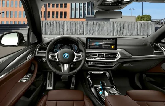 BMW iX3 interior dashboard with Alexa+ voice assistant interface