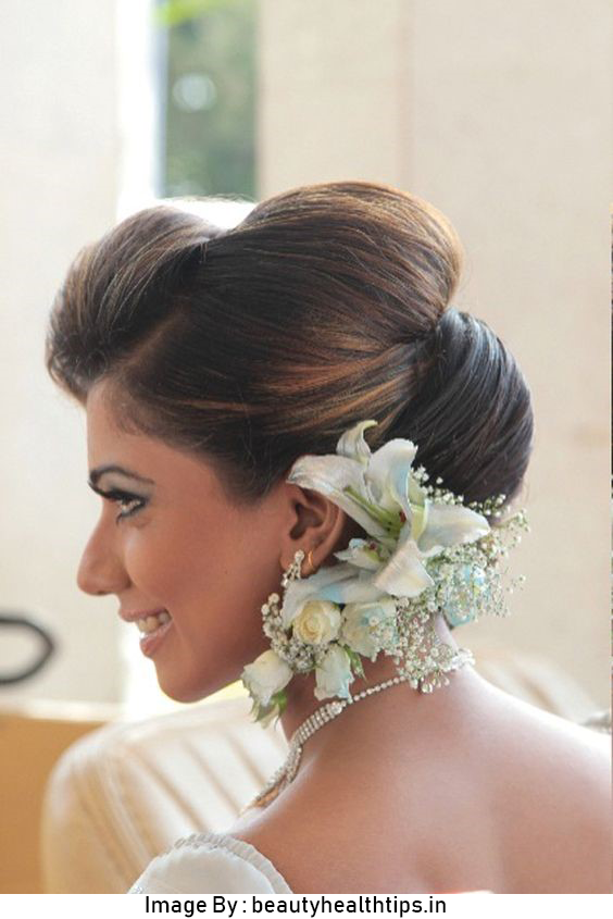 Double puff bun decorated with Flowers