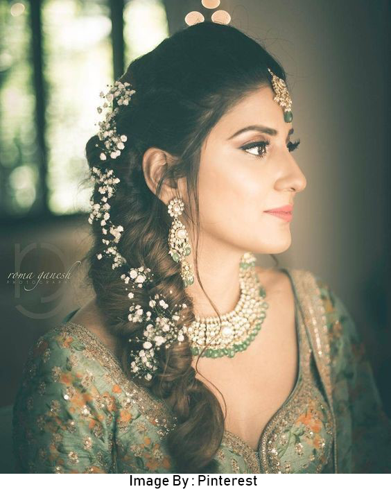 Fishtail braid decorated with flowers